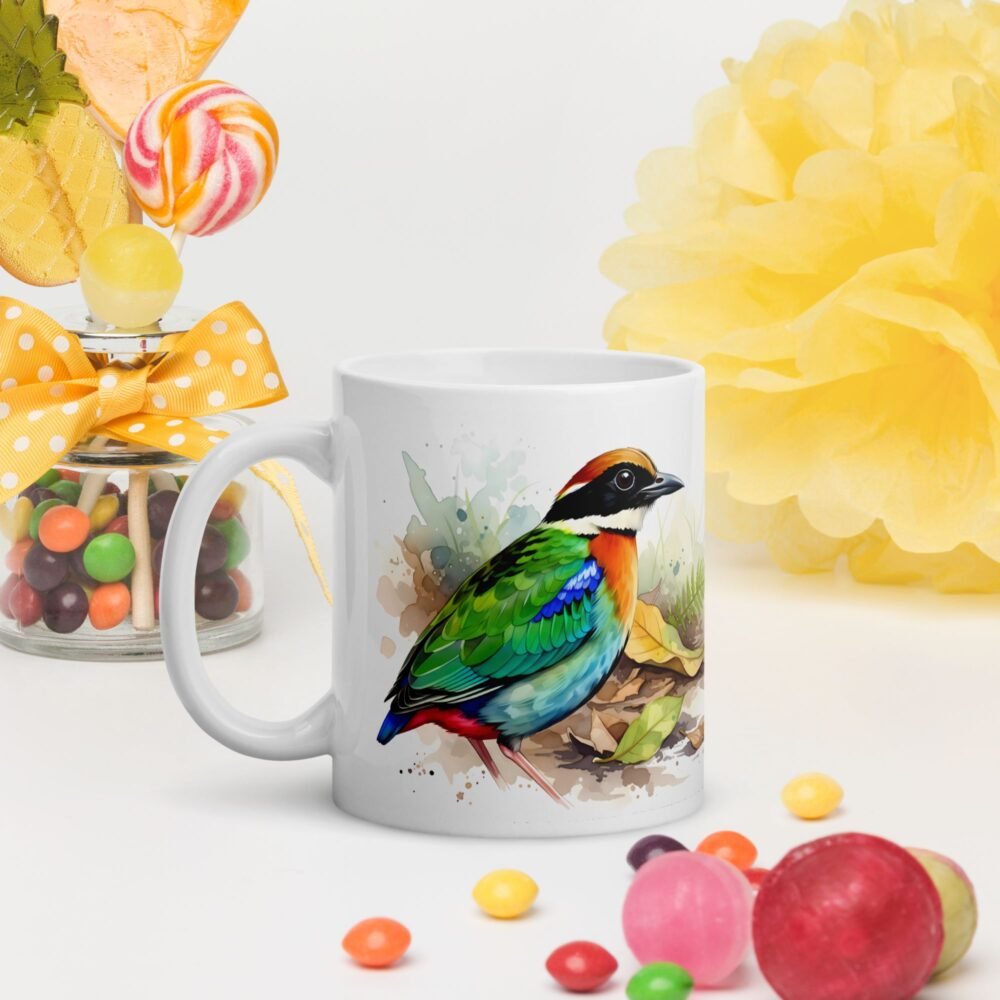 Illustrated Pittidae family kitchenware featuring colorful bird art on a unique whimsical mug.