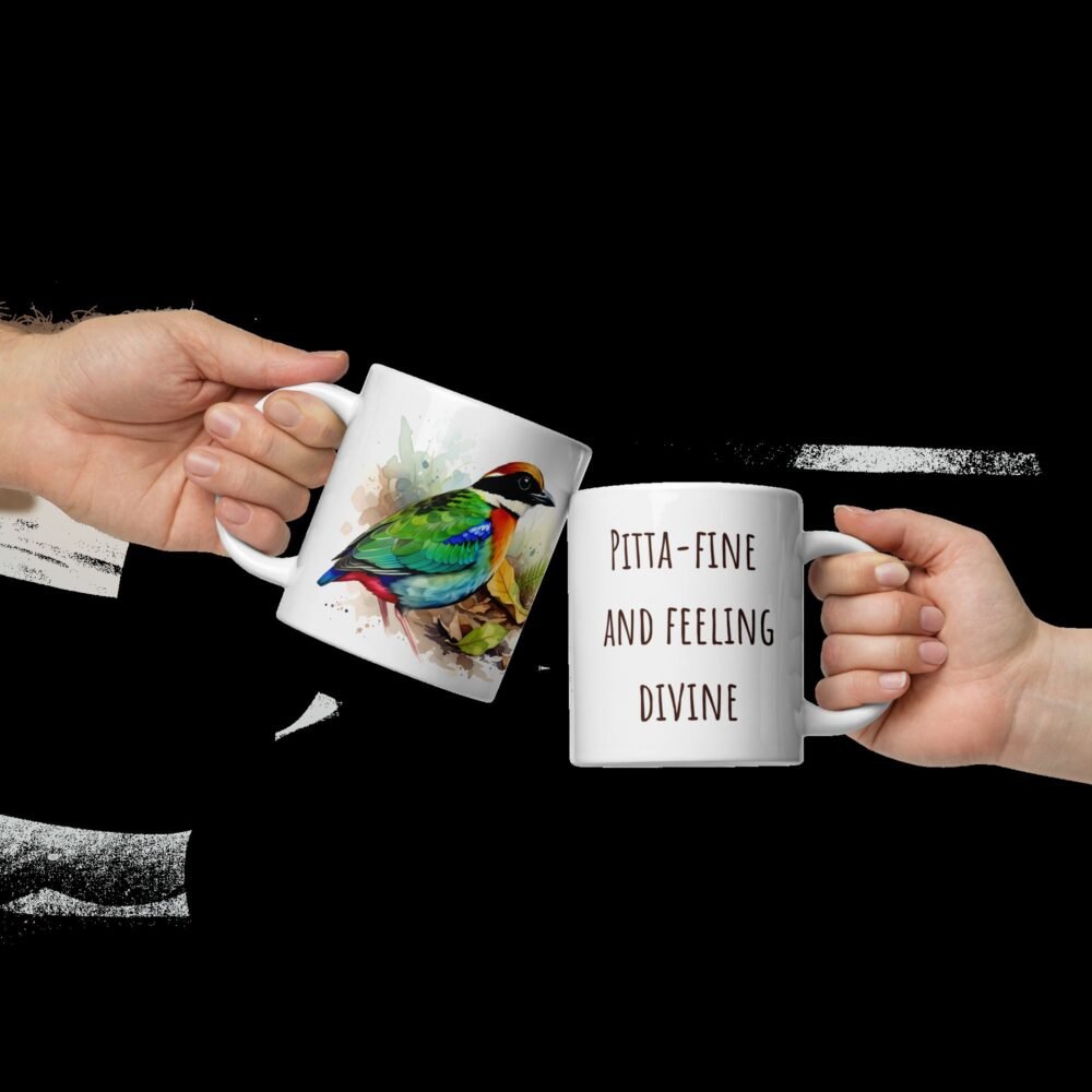 Vibrant watercolor Pitta design on a ceramic tea cup; a charming nature lover present.