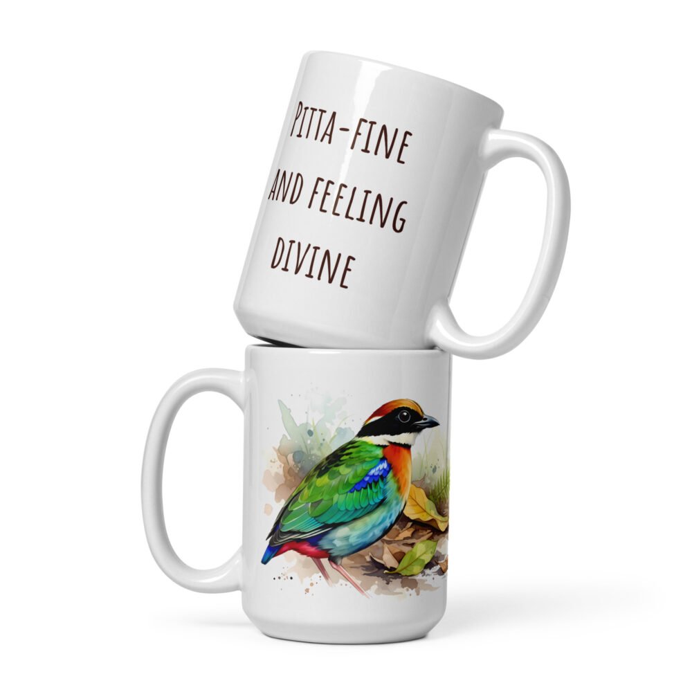 Charming bird watcher gift: A Rainbow Pitta mug with a positive "Feeling Divine" saying.