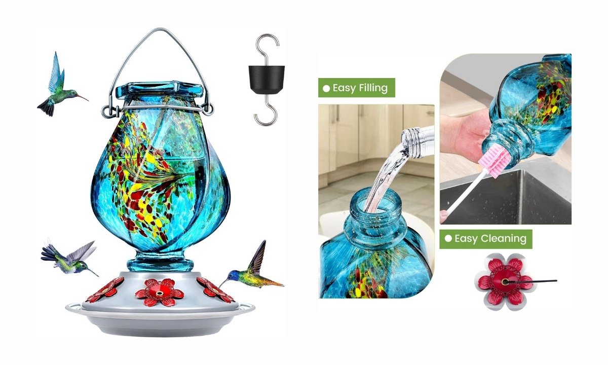 A composite image advertising a hand-blown glass hummingbird feeder. The main image on the left showcases the complete feeder, which has a teardrop-shaped glass bottle with a vibrant blue, yellow, and red mottled pattern. It features a silver-colored base with red, flower-shaped feeding ports. Three hummingbirds are depicted flying around it. An S-hook and a black ant moat for hanging are also shown. The right side of the image highlights its features. An image labeled "Easy Filling" shows water being poured into the feeder's wide mouth. Below it, an image labeled "Easy Cleaning" shows a hand using a brush to clean the inside of the bottle. A close-up of a detachable red flower feeding port is also included.