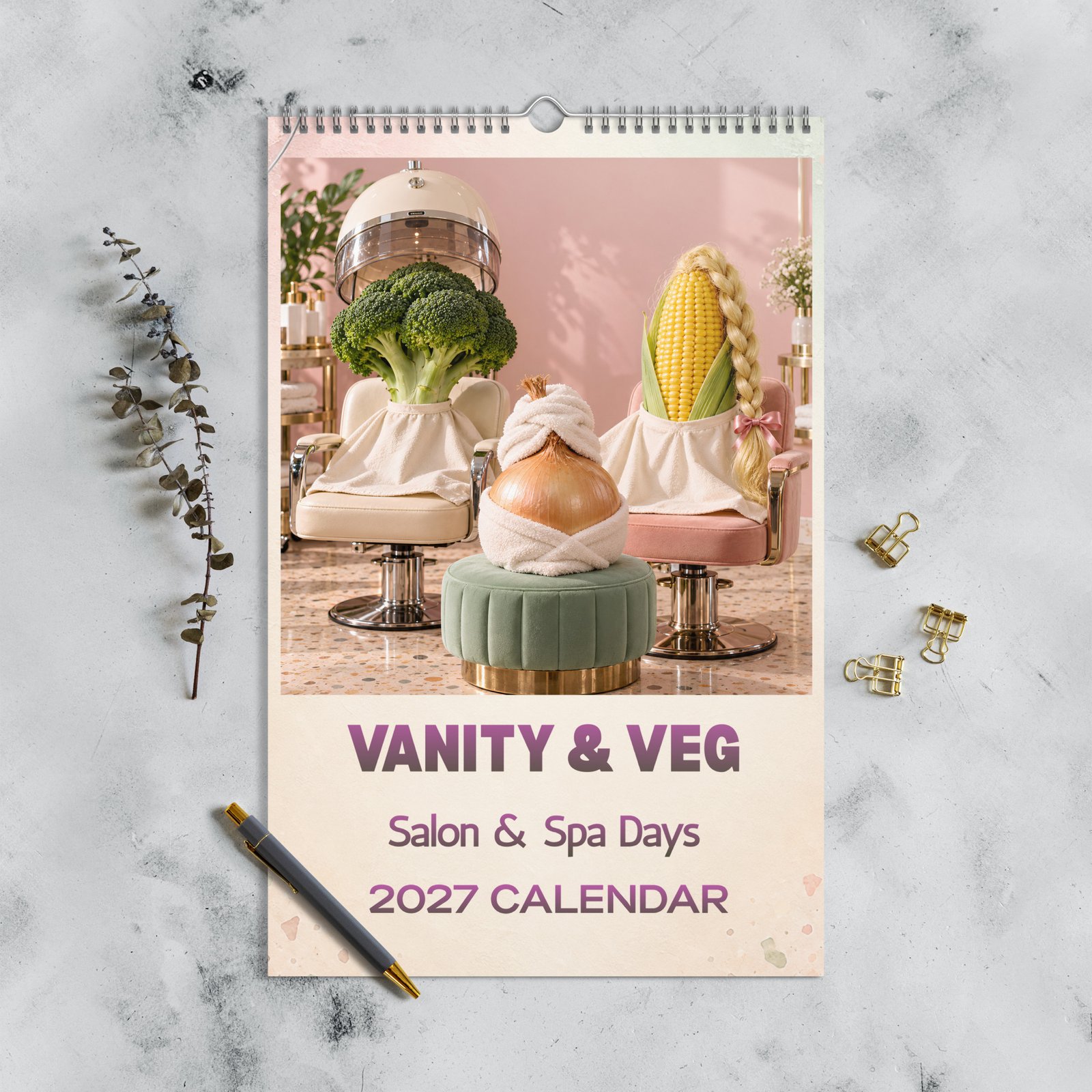 Vanity & Veg 2027 wall calendar with broccoli, braided sweetcorn and a towel-wrapped onion in a beauty salon